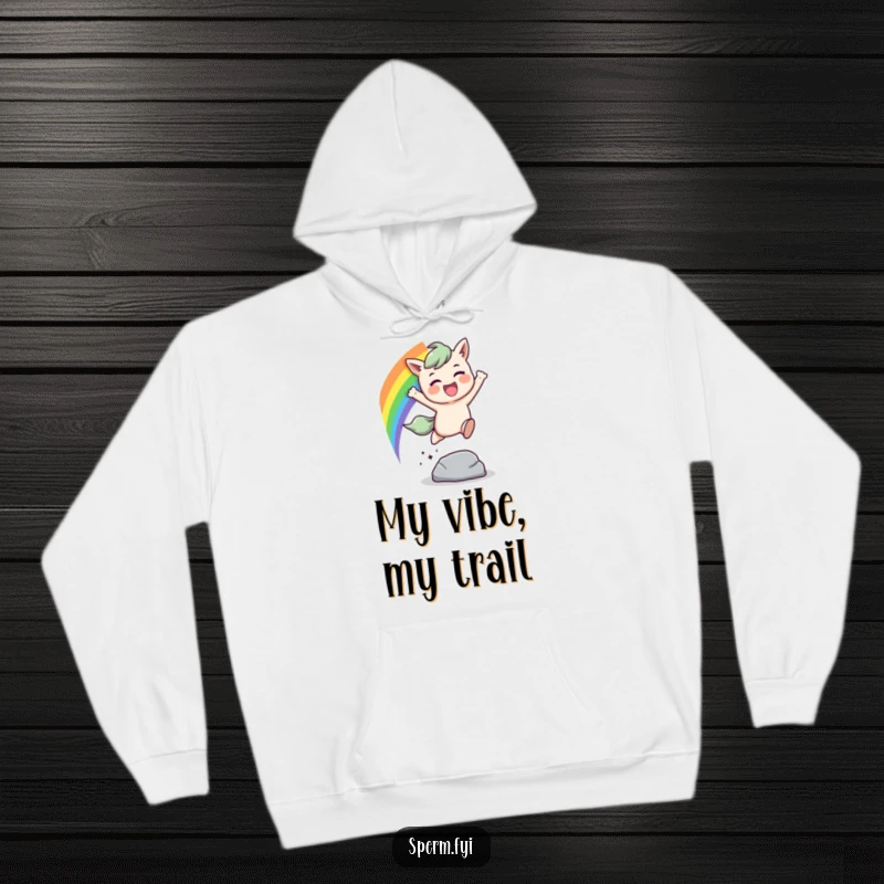 Funny rainbow leap hoodie, a character jumping over an obstacle with a bright rainbow trail, cozy and motivational.